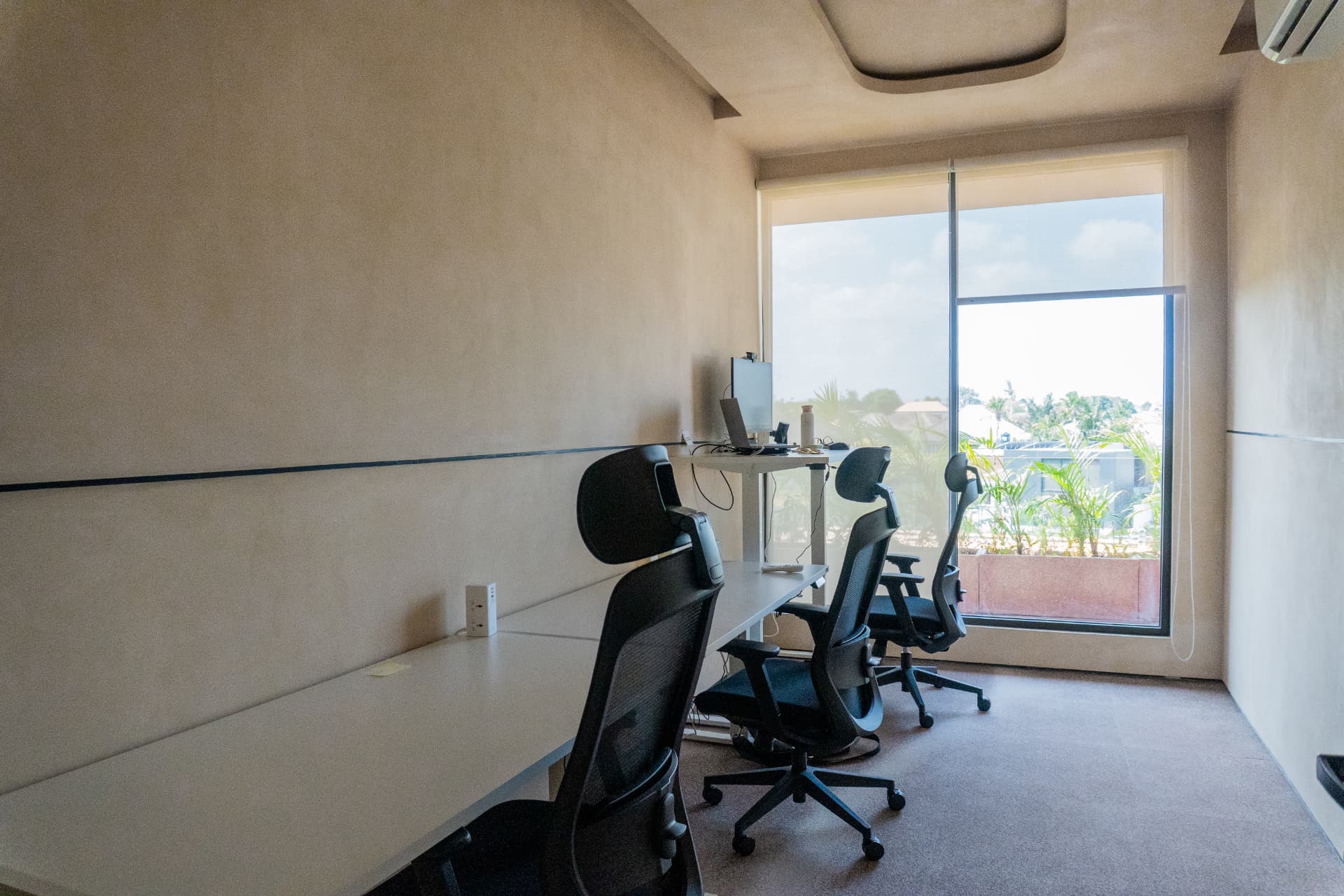 A private office at Argil in Pererenan, with desks for a small team
